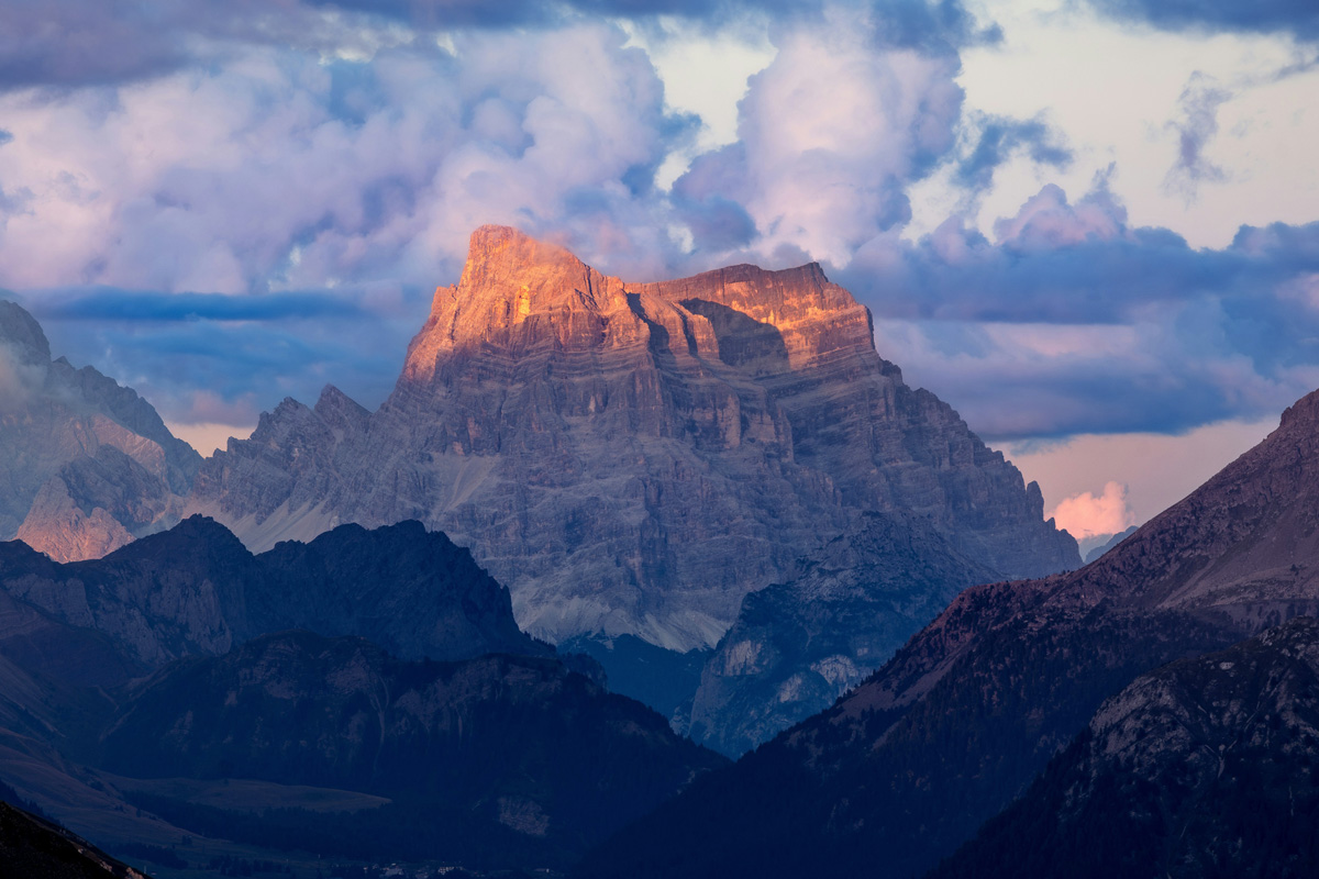 A mountain with clouds